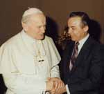 John Paul II receives CESJ president Norman Kurland.